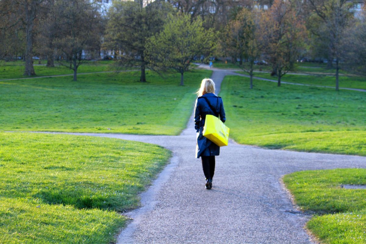 Woman deciding which path she wants to take while making changes during the Medicare Advantage open enrollment period