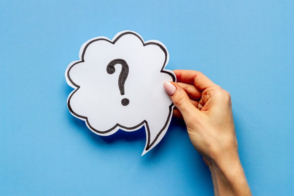 Person holding question mark, wondering what changes they can make during Medicare Advantage Open Enrollment Period