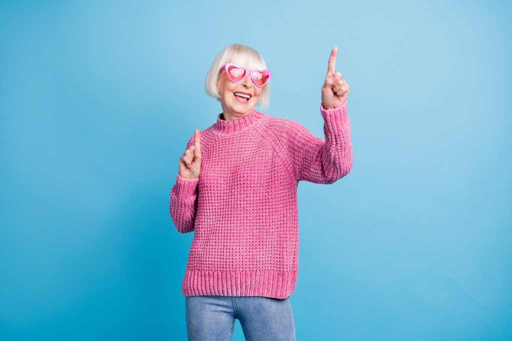 Woman celebrating the fact that she is planning for Medicare