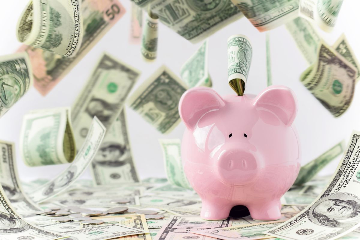 Medicare Advantage MSA piggy bank with dollar bills falling into it
