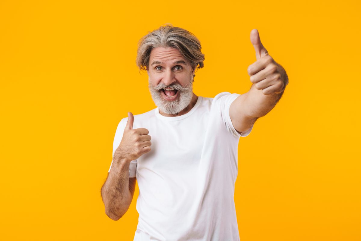 Guy with two thumbs up after hearing about the benefits of a Medicare Advantage PPO plan