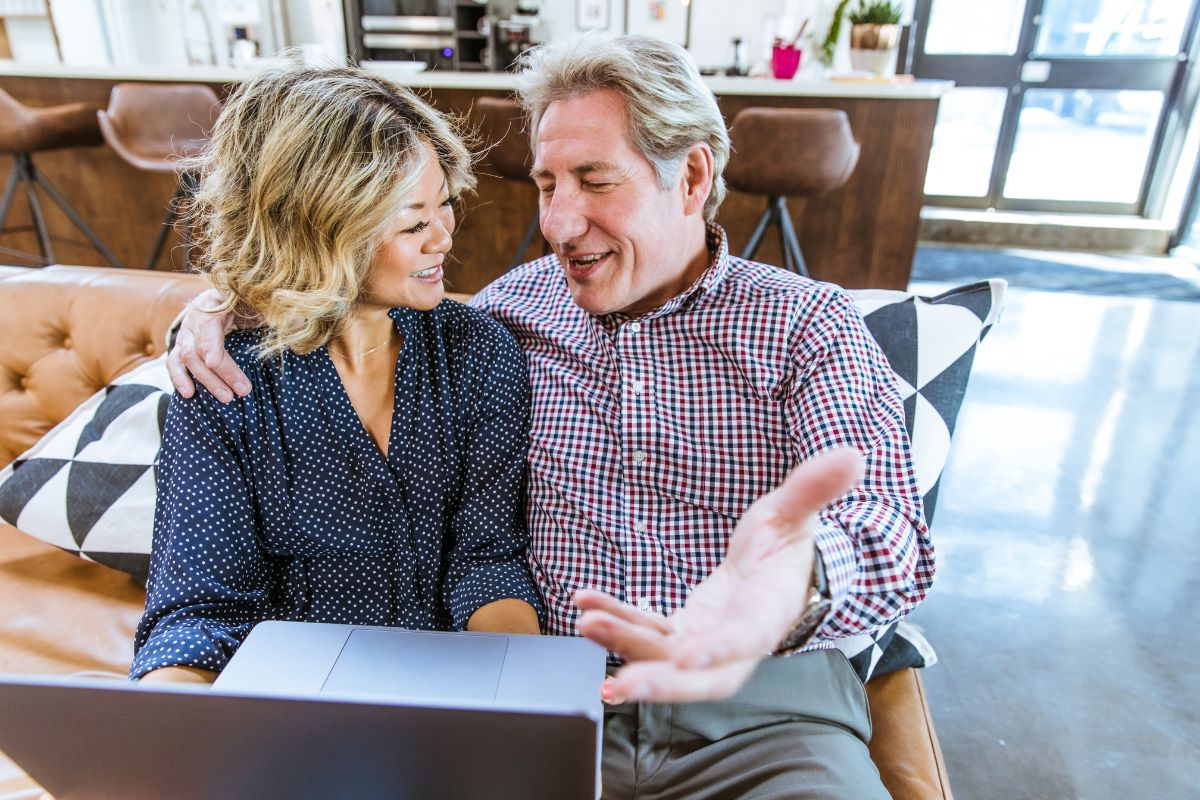 Couple reviewing their cancer insurance options