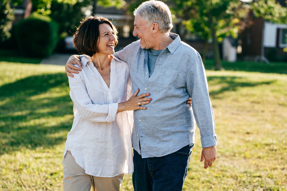 Happy couple who qualified for help through a Medicare Savings Program