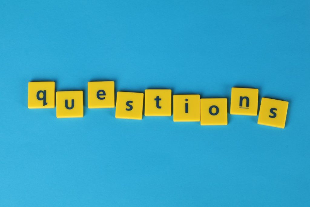 "Questions" spelled out in tiles