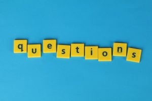 "Questions" spelled out in tiles