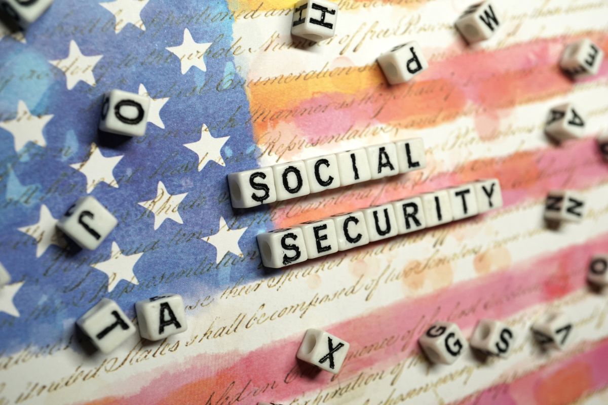 American flag with tiles that spell social security on it