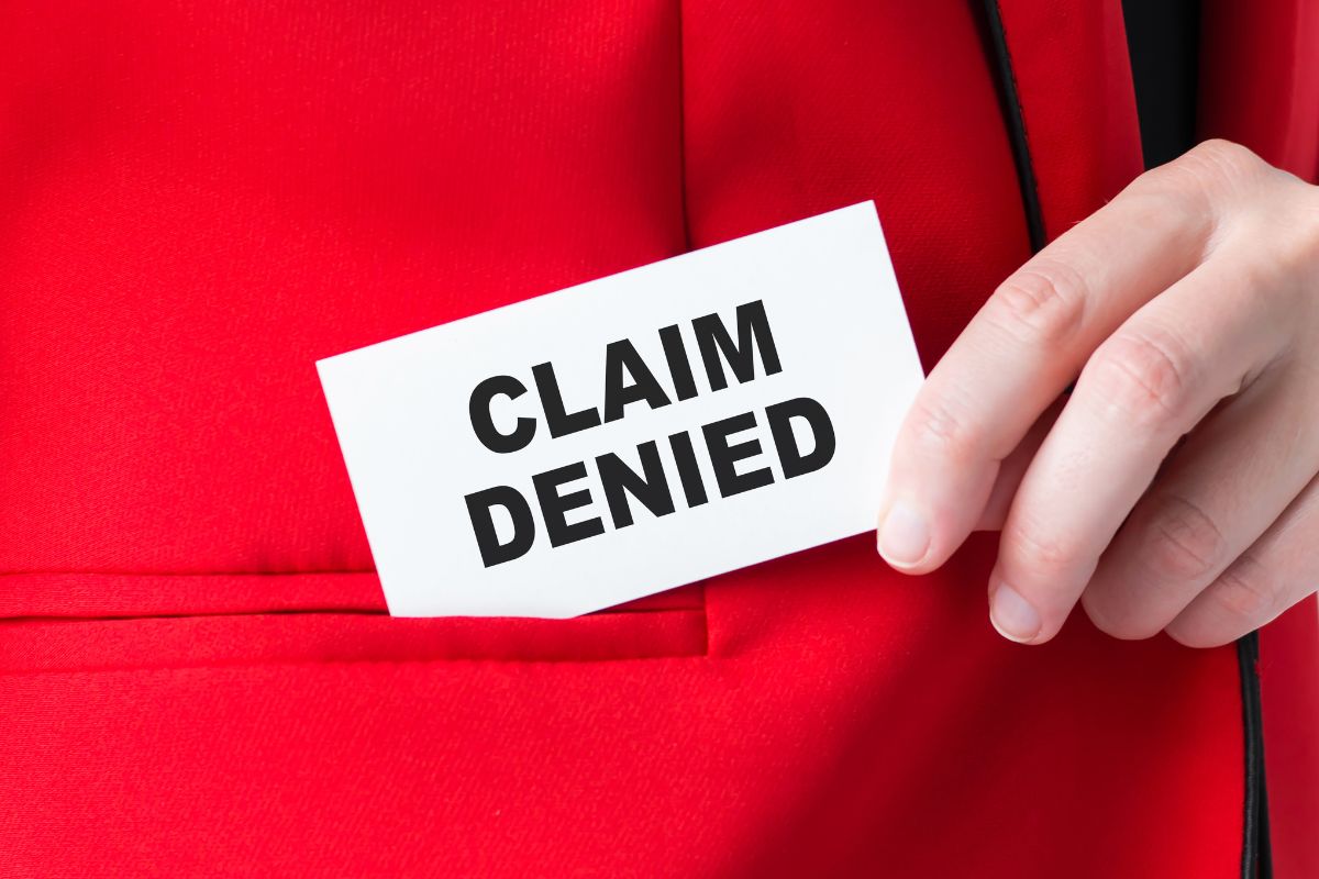 Ticket with "claim denied" written on it.